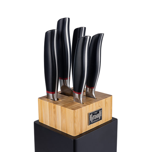 A set of knives with a Smart Shef stand